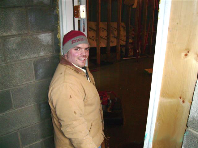 PCTVFD member Josh helping pump flooded home